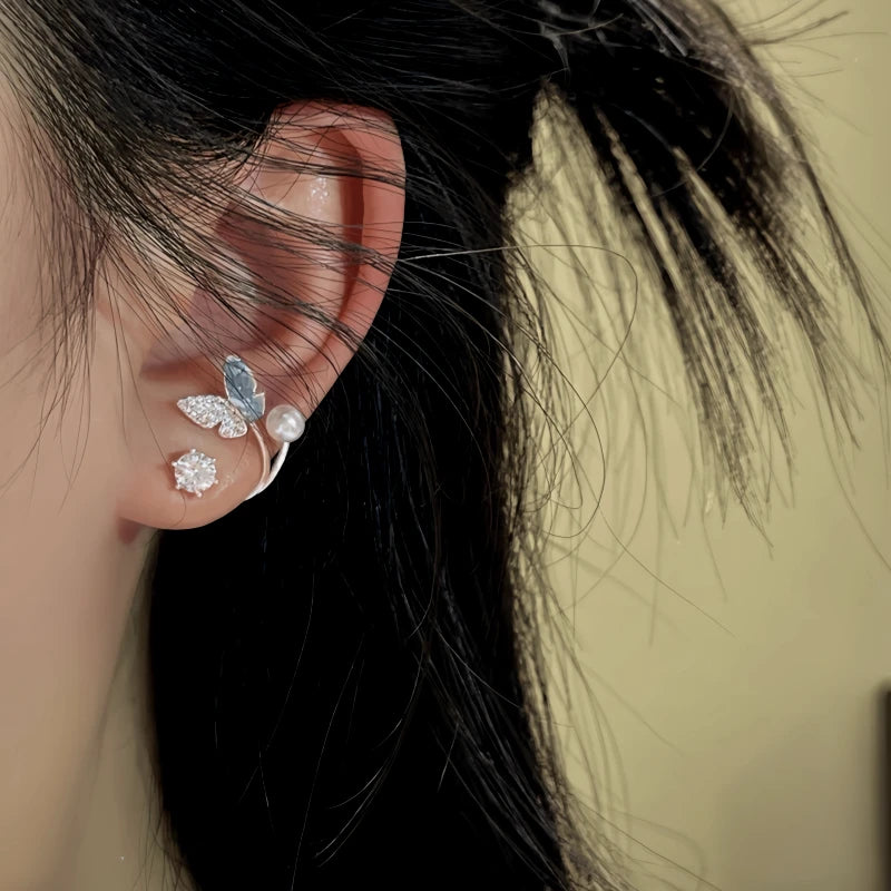 Close-up detail of the sparkling zircons and plating on the Butterfly Jacket Earrings