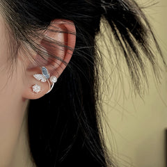 Close-up detail of the sparkling zircons and plating on the Butterfly Jacket Earrings