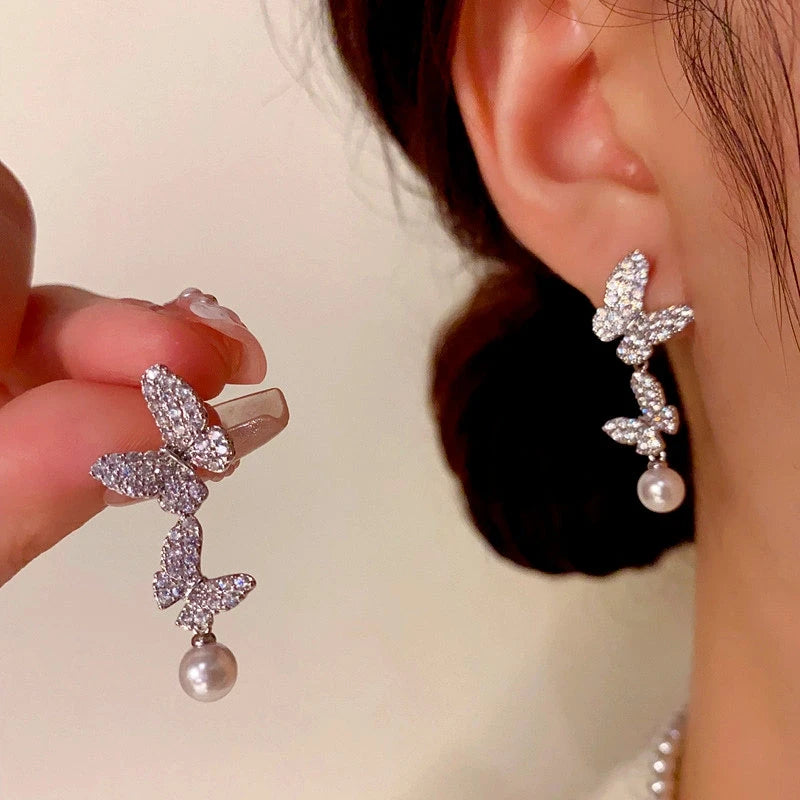 Close-up detail of the sparkling zircons and plating on the Pearl Tassel Earrings