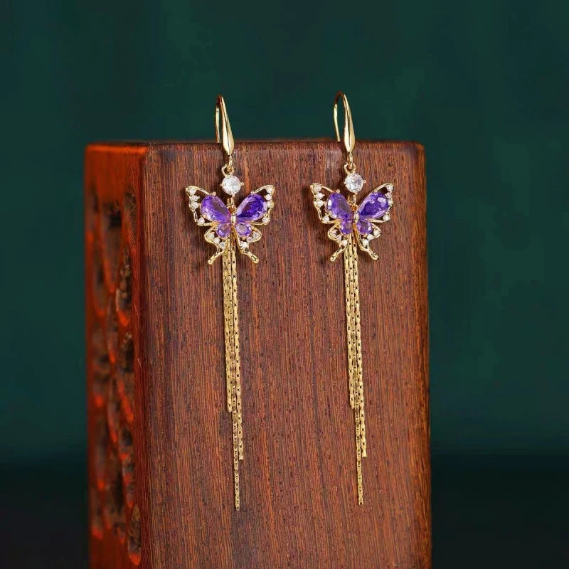 Close-up detail of the sparkling zircons and plating on the Butterfly Threader Earrings