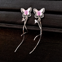 Angled view of the 14K Gold-Plated Zircon Butterfly Tassel Earrings