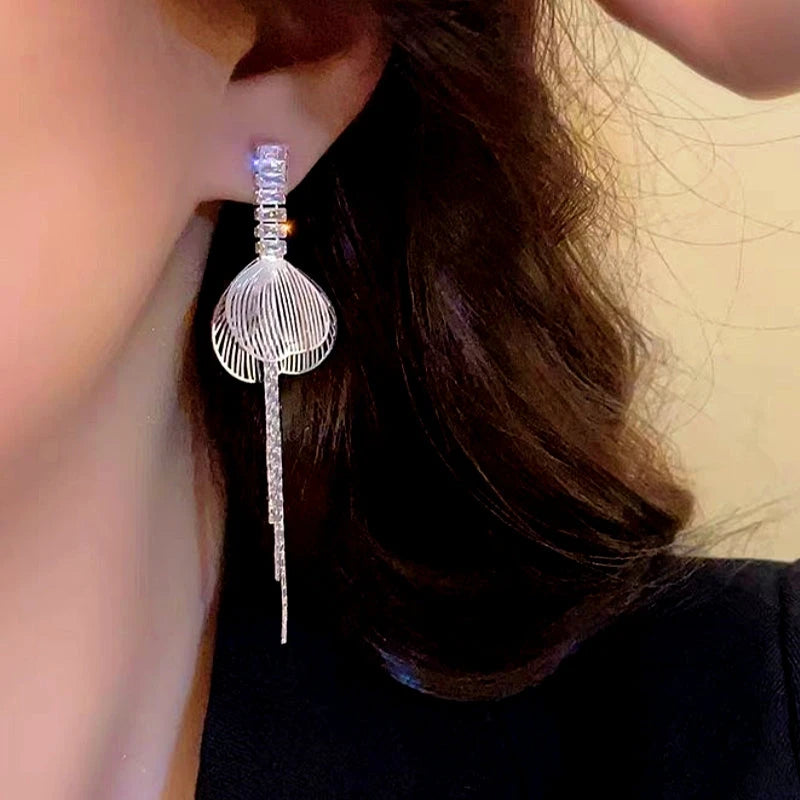 Close-up detail of the sparkling zircons and plating on the Butterfly Wing Earrings