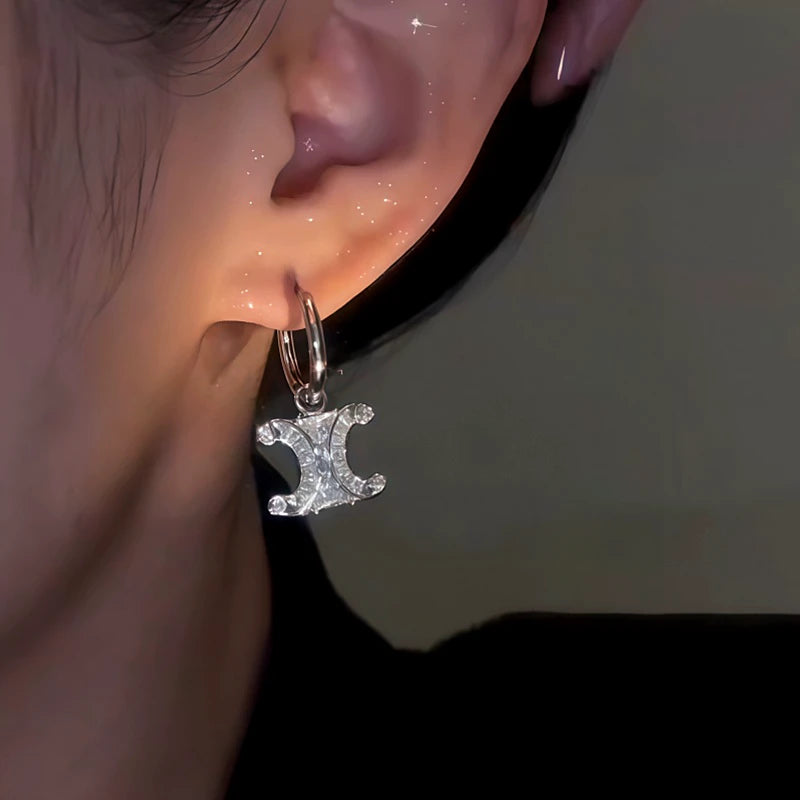 Close-up detail of the sparkling zircons and plating on the Silver Hoop Earrings