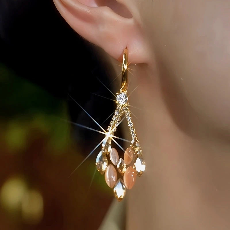 Close-up detail of the sparkling zircons and plating on the Cat's Eye Earrings