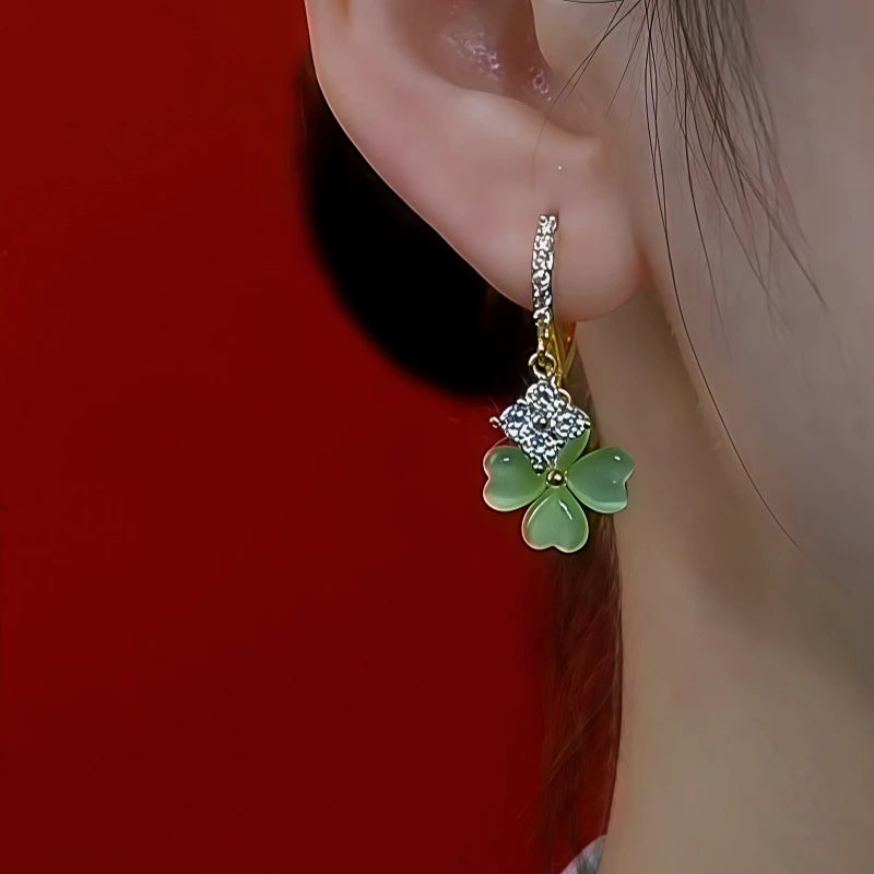 Close-up detail of the sparkling zircons and plating on the Four-Leaf Clover Earrings