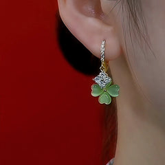 Close-up detail of the sparkling zircons and plating on the Four-Leaf Clover Earrings