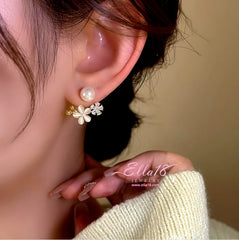Close-up detail of the sparkling zircons and plating on the Flower Pearl Jacket Earrings