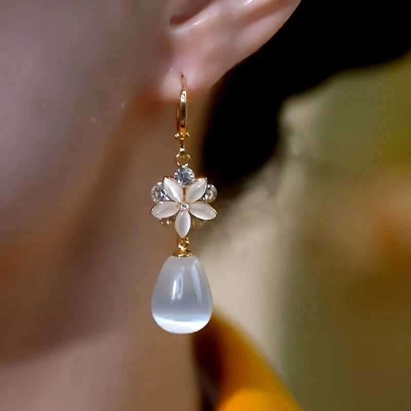 Close-up detail of the sparkling zircons and plating on the Flower Water Drop Earrings