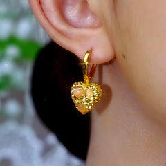 Close-up detail of the sparkling zircons and plating on the Cat's Eye Heart Earrings