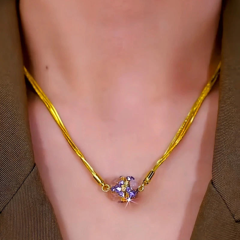 Detailed view of the 14K Gold-Plated Zircon Cat's Eye Storn Magnetic Necklace chain and pendant