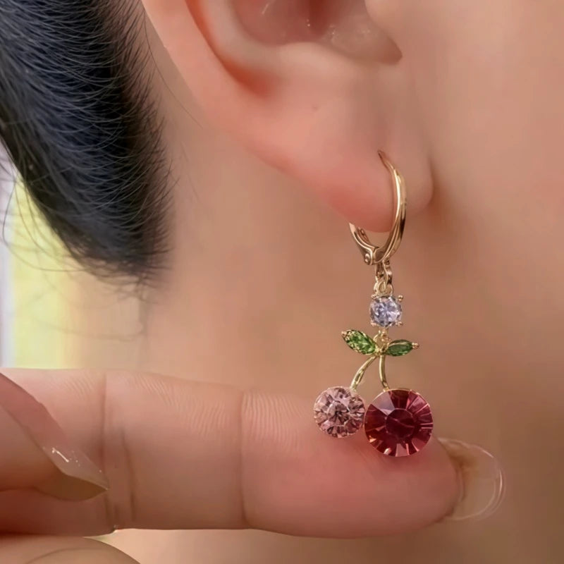Close-up detail of the sparkling zircons and plating on the Red Cherry Earrings