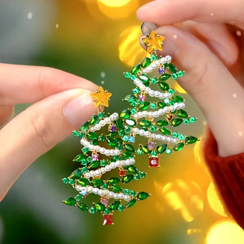 Angled view of the 14K Gold-Plated Zircon Christmas Diamond Pearl Forest Tree Earrings
