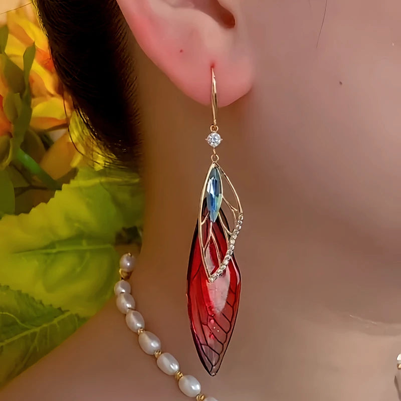 Close-up detail of the sparkling zircons and plating on the Colored Feather Earrings