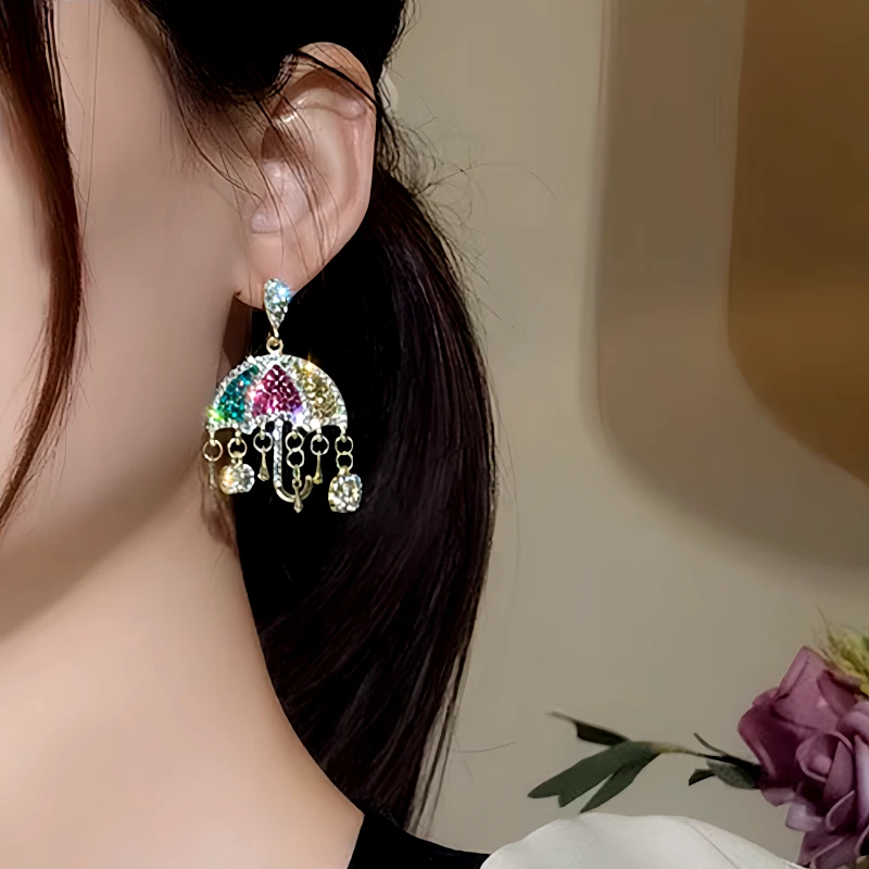 Model showcasing the dangle and style of the 14K Gold-Plated Zircon Colorful Umbrella Tassel Earrings