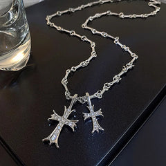 Close-up of the pendant and clasp on the Silver Cross Necklace