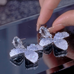 Close-up detail of the sparkling zircons and plating on the Crystal Flower Earrings