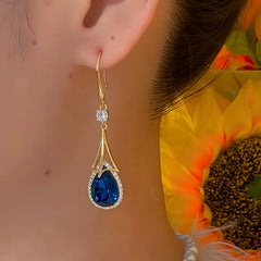 Close-up detail of the sparkling zircons and plating on the Blue Tassel Earrings