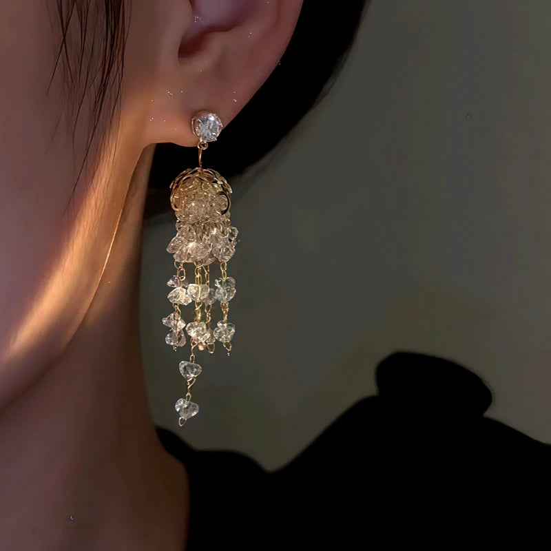 Close-up detail of the sparkling zircons and plating on the Jellyfish Tassel Earrings