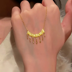 14K Gold-Plated Zircon Diamond-Studded Crescent Tassel Necklace worn to showcase its length and pendant detail