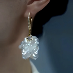 Close-up detail of the sparkling zircons and plating on the White Petal Earrings