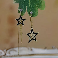 Angled view of the 14K Gold-Plated Zircon Diamond Asymmetrical Five-Star Earrings