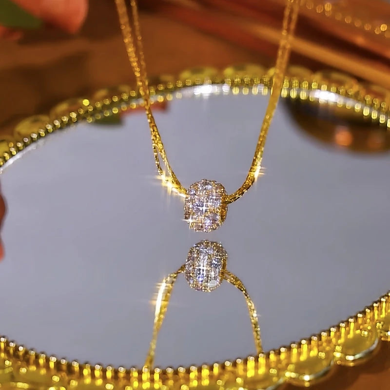 Detailed view of the 14K Gold-Plated Zircon Diamond Ball Pendant Necklace chain and pendant