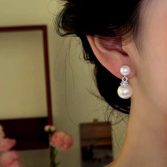 Close-up detail of the sparkling zircons and plating on the Bead Drop Earrings