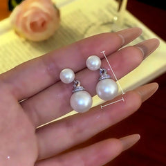 Angled view of the 14K Gold-Plated Zircon Diamond Bead Earrings