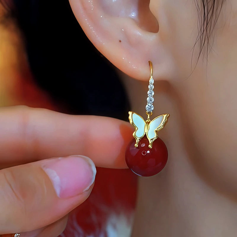 Close-up detail of the sparkling zircons and plating on the Butterfly Ear Hooks
