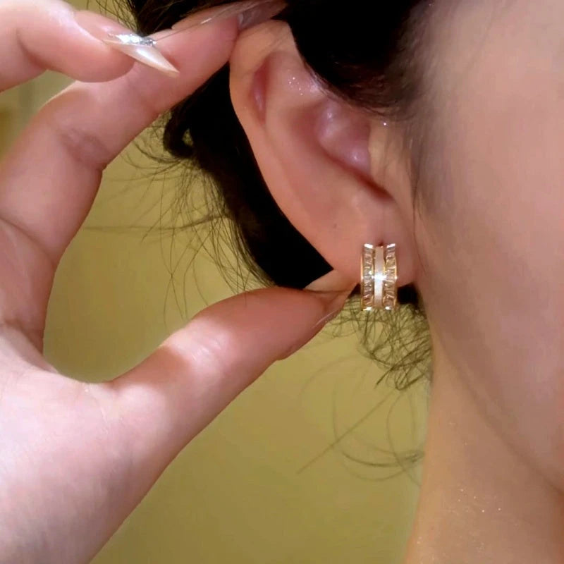 Close-up detail of the sparkling zircons and plating on the Diamond C-Shaped Hoops