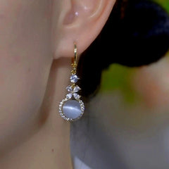 Close-up detail of the sparkling zircons and plating on the Cat's Eye Bead Earrings