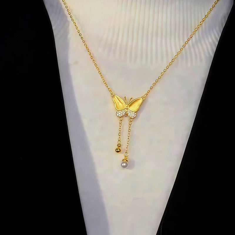 Close-up of the pendant and clasp on the Butterfly Tassel Necklace