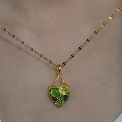Close-up of the pendant and clasp on the Cat's Eye Heart Necklace