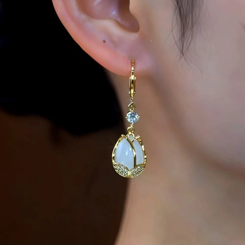 Close-up detail of the sparkling zircons and plating on the Tulip Flower Earrings