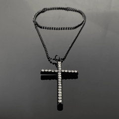 Close-up of the pendant and clasp on the Red Cross Necklace