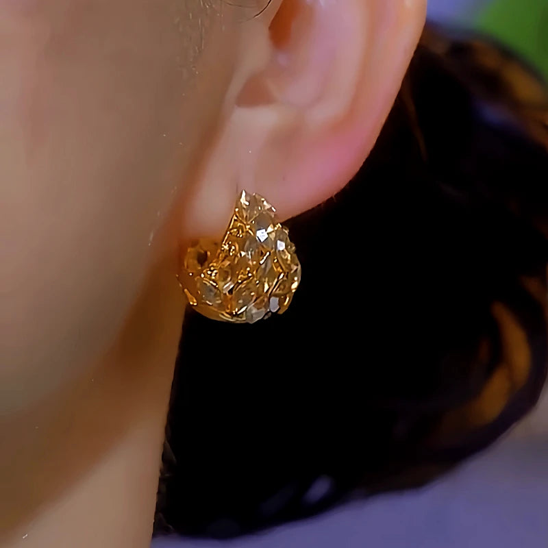 Close-up detail of the sparkling zircons and plating on the Diamond Dangle Earrings