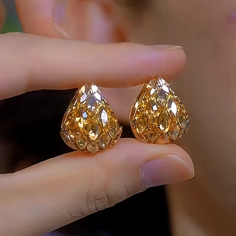 Angled view of the 14K Gold-Plated Zircon Diamond Earrings