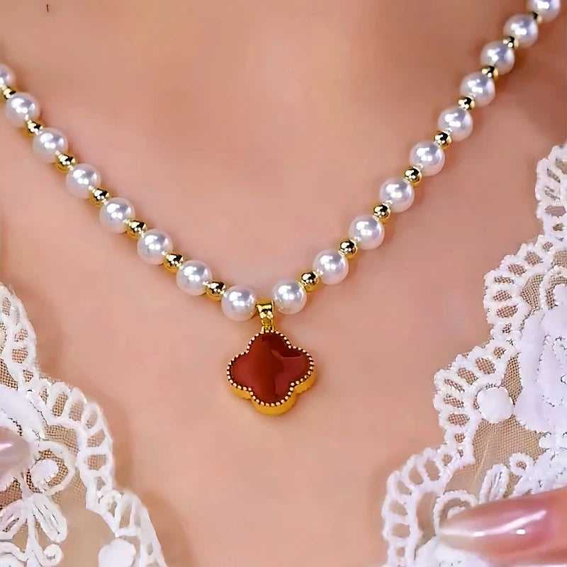 14K Gold-Plated Zircon Diamond Four-Leaf Clover Double-Sided Pearl Necklace worn to showcase its length and pendant detail