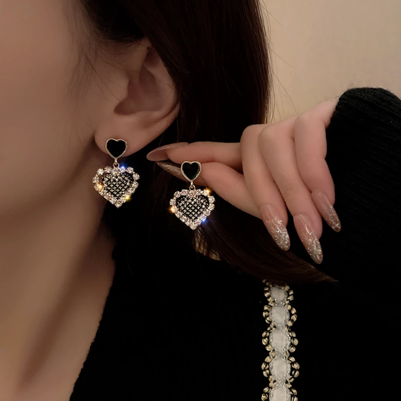 Styling the Red Heart Dangle Earrings for a chic and modern look