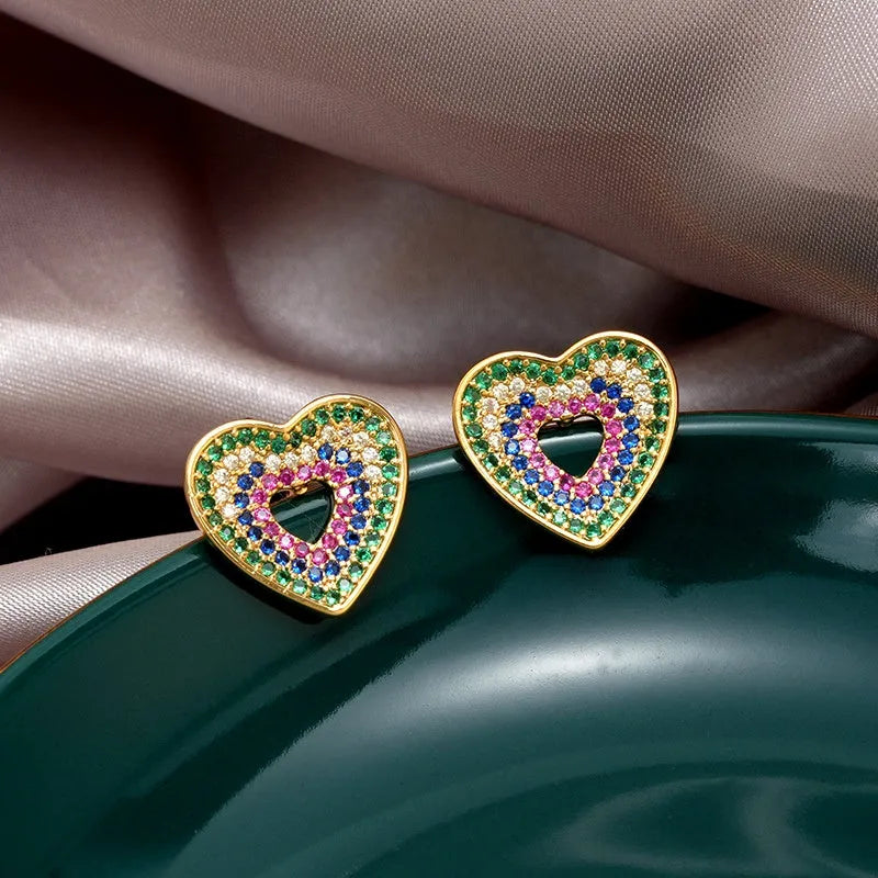 Angled view of the 14K Gold-Plated Zircon Diamond Heart Stud Earrings