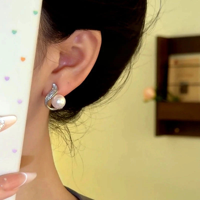 Close-up detail of the sparkling zircons and plating on the Silver Leaf Studs