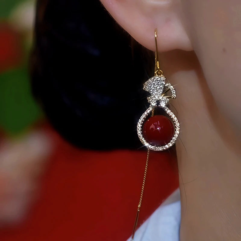 Close-up detail of the sparkling zircons and plating on the Lucky Bag Earrings