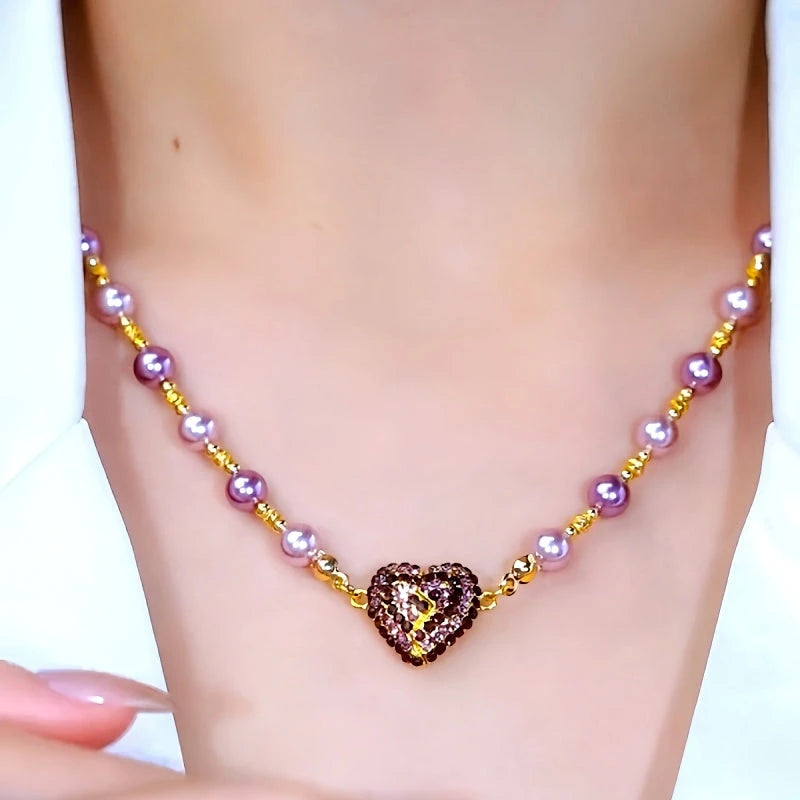 Close-up of the pendant and clasp on the Magnetic Heart Necklace