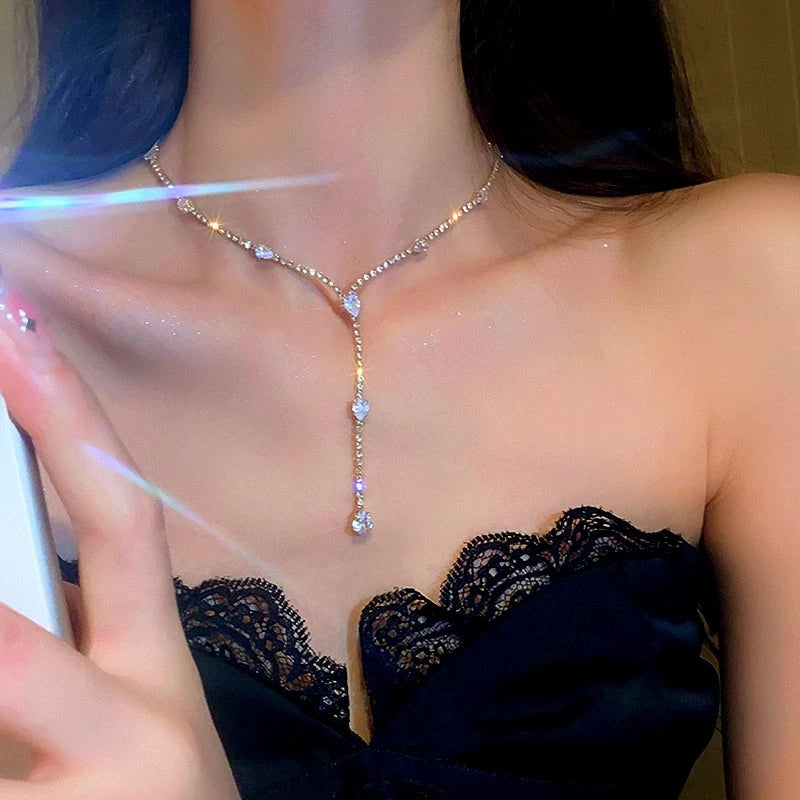 Close-up of the pendant and clasp on the Silver Solitaire Necklace