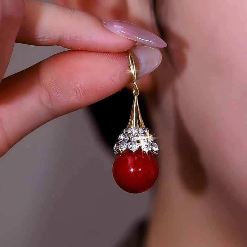 Close-up detail of the sparkling zircons and plating on the Pearl Ear Hooks
