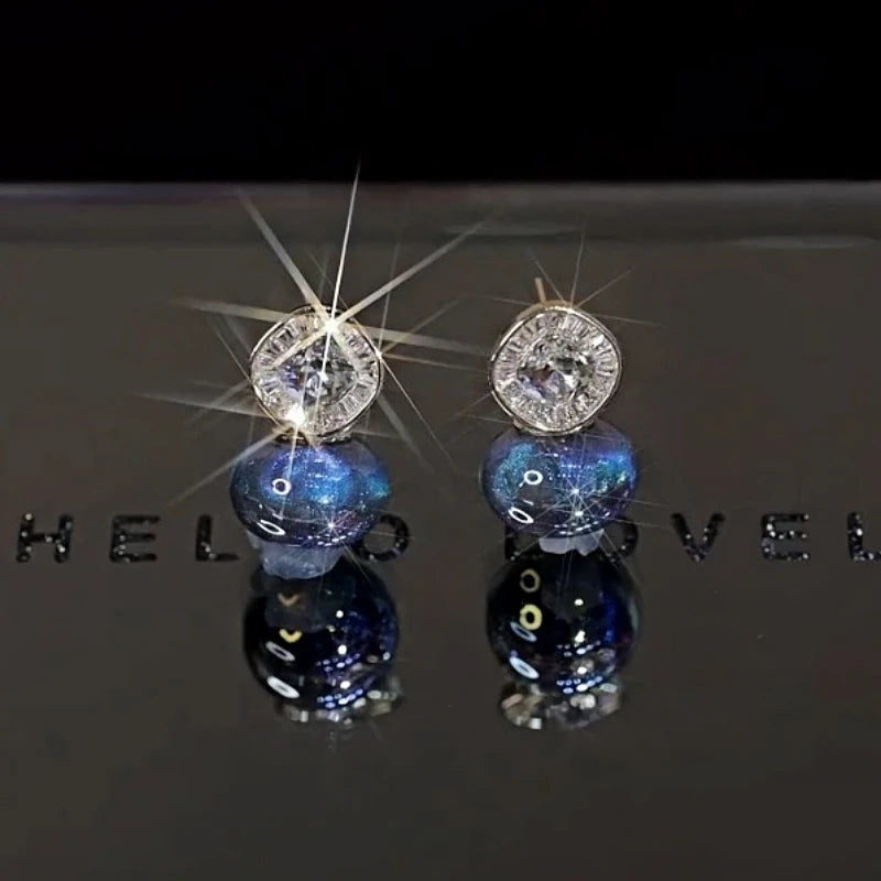 Angled view of the 14K Gold-Plated Zircon Diamond Pearl Earrings
