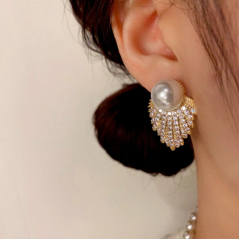 Close-up detail of the sparkling zircons and plating on the Pearl Tassel Earrings