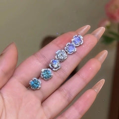 Model showcasing the dangle and style of the 14K Gold-Plated Zircon Diamond Stud Earrings