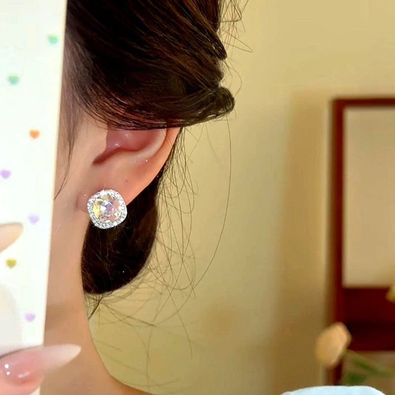 Close-up detail of the sparkling zircons and plating on the Silver Stud Earrings
