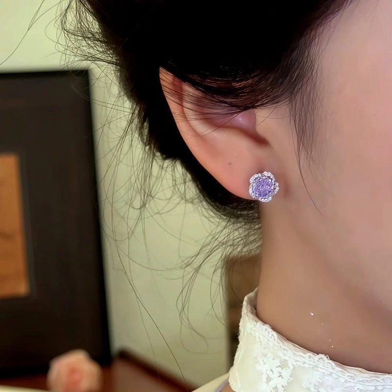 Close-up detail of the sparkling zircons and plating on the Floral Stud Earrings